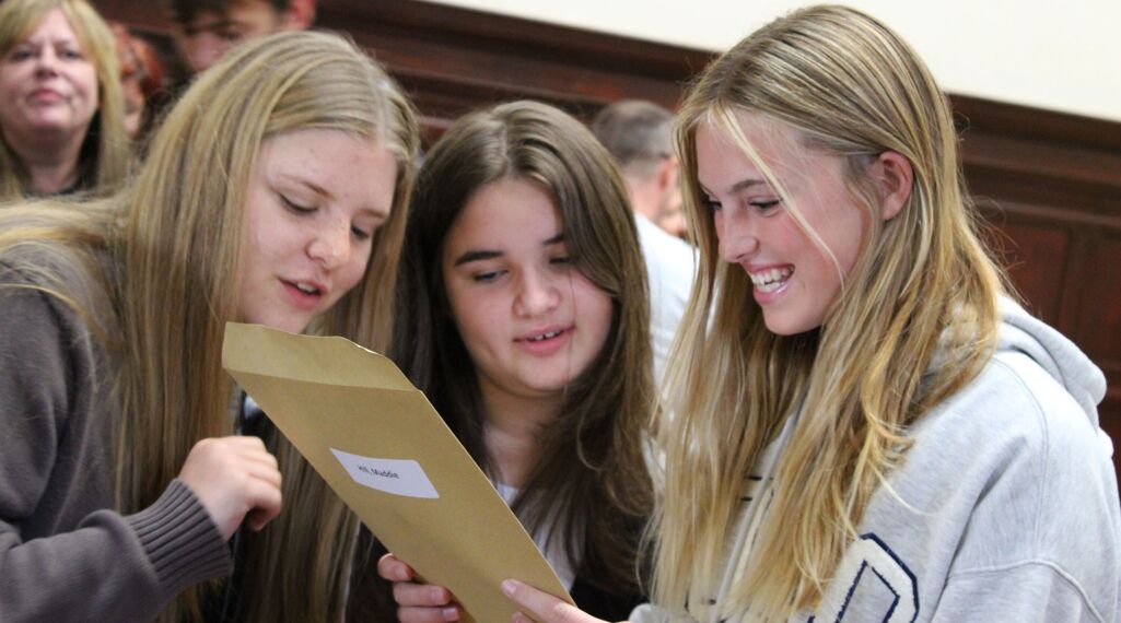 Year 11 students at Lytchett Minster School celebrate fantastic GCSE results!